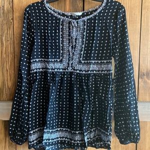 Womens top. Really cute! Size L but more like a medium or small.